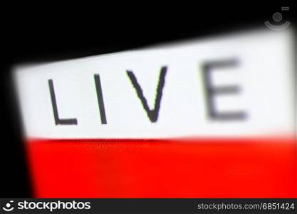 Live Lettering on white Background, Macro Photography of Television Screen