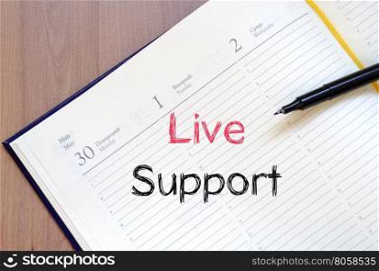 Live support text concept write on notebook