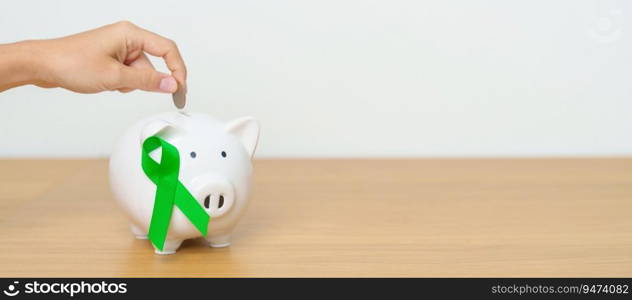 Liver, Gallbladders, bile duct, cervical, kidney Cancer and Lymphoma Awareness month, green Ribbon with Piggy Bank for support illness life. Health, Donation, Charity, C&aign, Money Saving, Fund 