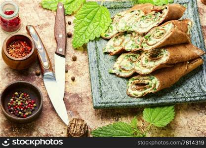 Liver pancakes stuffed with herbs, cheese, garlic and mayonnaise.Healthy breakfast. Delicious liver pancakes.