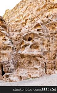 living ancient cavern and steps in Little Petra, Jordan