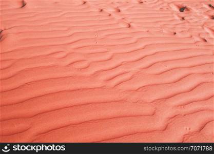 Living Coral color background, Color of the year 2019, Texture of sand dune in the desert