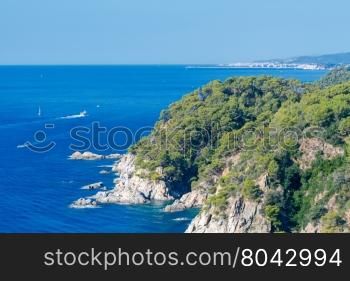 Lloret de Mar. The coastline of Costa Brava.. View of the rocky coast of the Costa Brava near Lloret de Mar resort.