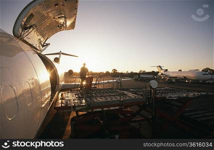 Loading freight onto Boeing 727 jet aircraft