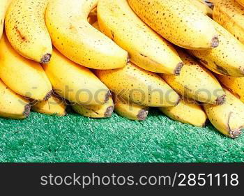 Loads of yellow bananas in a horizontal composition