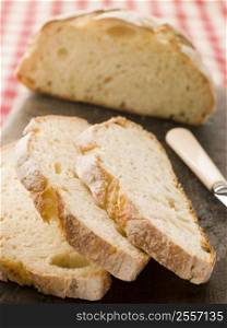 Loaf and Slices of American Sour Dough Bread