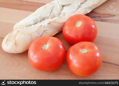 Loaf of bread with tomatoes delicious breakfast