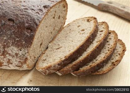 Loaf of healthy German Sourdough bread and slices