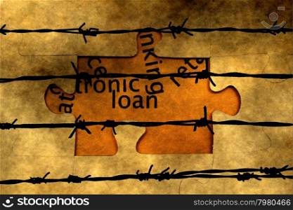 Loan puzzle against barbwire
