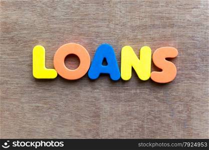 loans colorful word in the wooden background