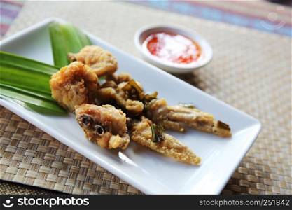 Local food Thai Fried chicken on wood background