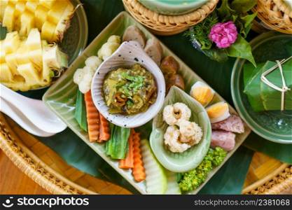 "Local Tradition Northern Thai style food "Kan Tok". Mix Thai cuisine full set of food. Variety of north eastern Thai dishes.Thai food concept."