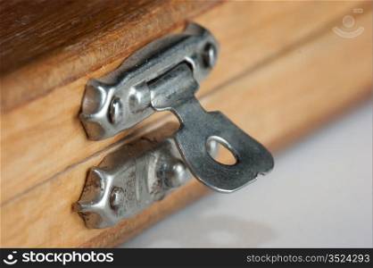lock on a wooden box macro