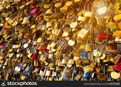 Locks of love on the bridge in Paris, France