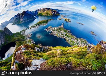 Lofoten is an archipelago in the county of Nordland, Norway.. Lofoten is an archipelago in the county of Nordland, Norway.Is known for a distinctive scenery with dramatic mountains and peaks, open sea and sheltered bays, beaches and untouched lands. Fisheye lens