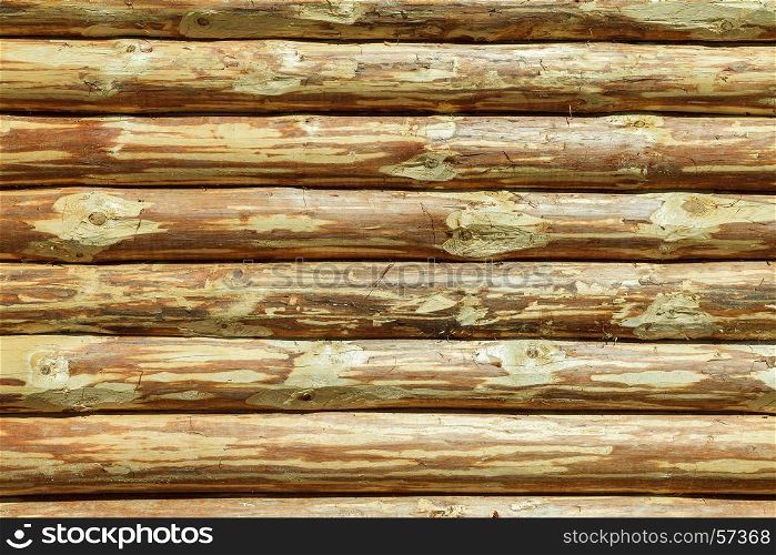 Log Cabin Or Barn Unpainted Debarked Wall Textured Horizontal Background With Copy Space. The Log Cabin Or Barn Unpainted Debarked Wall Textured Horizontal Background With Copy Space