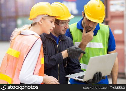 Logistic team worker working together to brainstorming analysis the problem report from laptop computer at port warehouse cargo shipping area.