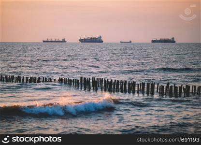 Logistics and transportation of International Container Cargo ship in the ocean at twilight sky, Freight Transportation, Shipping