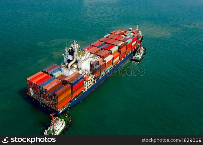 Logistics and transportation of International container cargo ship in the ocean freight aerial view