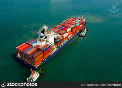 Logistics and transportation of International container cargo ship in the ocean freight aerial view