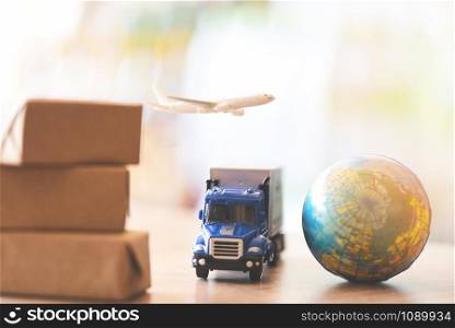 logistics transport import export shipping service Customers order things from via internet International shipping online concept Air courier Cargo plane boxes packaging freight forwarder to worldwid