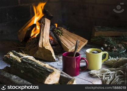 logs beverages near fireplace . Resolution and high quality beautiful photo. logs beverages near fireplace . High quality and resolution beautiful photo concept