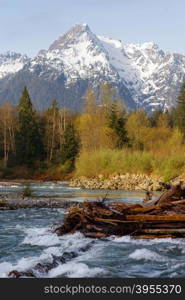 Logs jam up under the bridge on the Sauk River