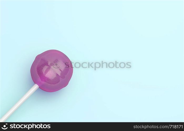 Lollipop on turquoise background, top view
