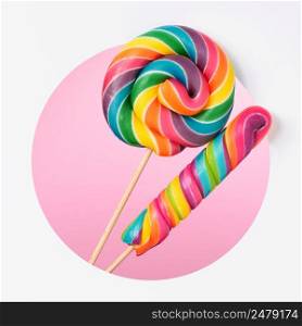 Lollipops candy colorful rainbow in a layered paper design