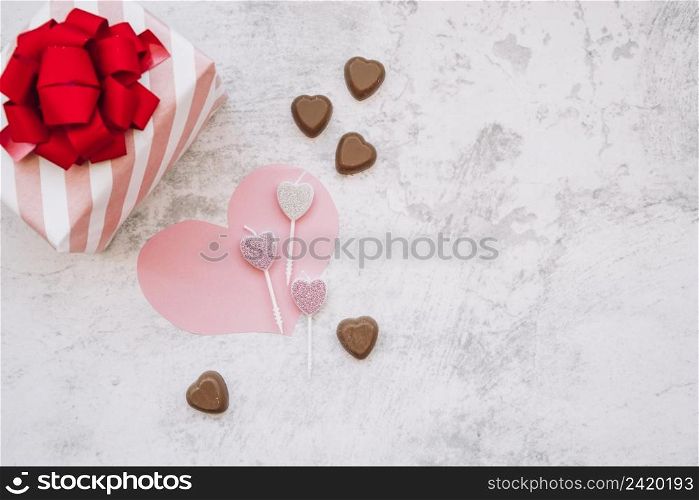 lollipops near chocolate sweet candies paper heart present box