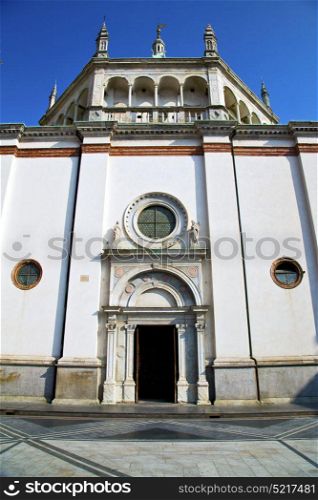 lombardy in the busto arsizio old church closed brick tower sidewalk italy