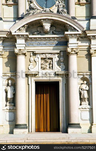 lombardy in the busto arsizio old church closed brick tower sidewalk italy