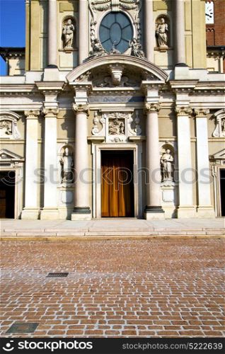 lombardy in the busto arsizio old church closed brick tower sidewalk italy