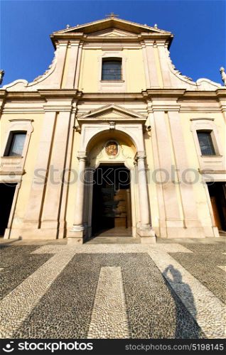 lombardy in the castano primo old church closed brick tower sidewalk italy