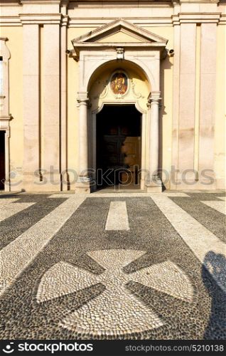 lombardy in the castano primo old church closed brick tower sidewalk italy