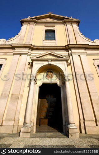 lombardy in the castano primo old church closed brick tower sidewalk italy