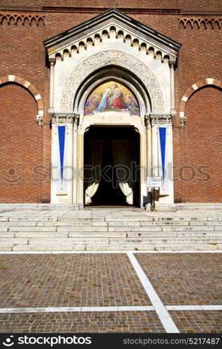 lombardy in the castellanza old church closed brick tower sidewalk italy