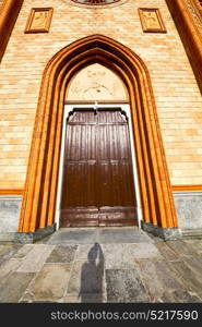 lombardy in the villa cortese old church closed brick tower wall italy