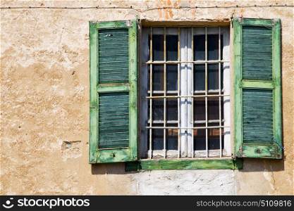 lonate ceppino varese italy abstract window green wood venetian blind in the white