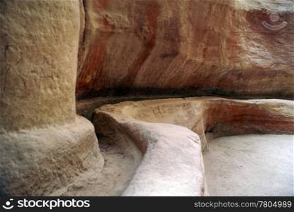 Lond stone aquaduct in mountain gorge Petra, Jordan