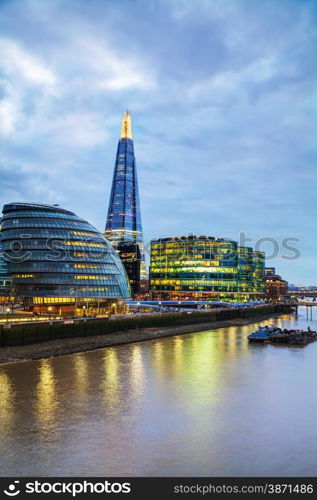 LONDON - APRIL 4: Overview of London with the Shard of Glass on April 4, 2015 in London, UK. Standing 306 metres high, the Shard is currently the tallest building in the European Union.