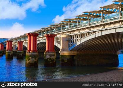 London Blackfriars Train bridge in Thames river UK