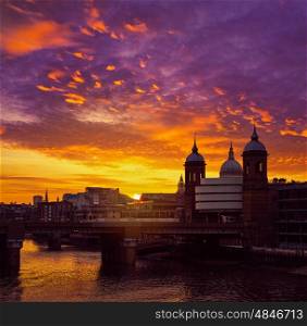 London Bridge sunset at Thames with St Paul Pauls Cathedral