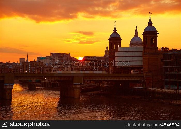 London Bridge sunset at Thames with St Paul Pauls Cathedral