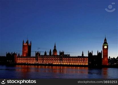 London circa 2009-Houses of Parliament at night viewed from south bank of Thames