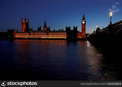 London circa 2009-Houses of Parliament at night viewed from south bank of Thames