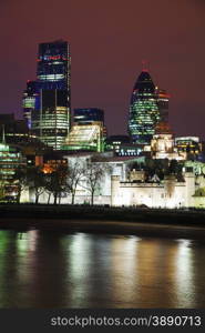 London city at the night time with the River Thames