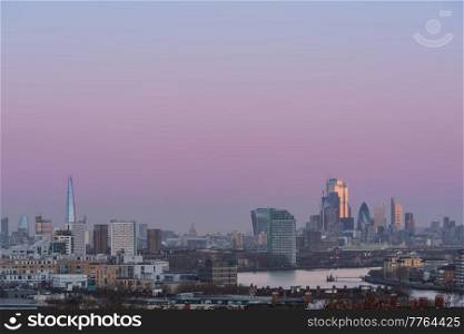 LONDON, JANUARY 30, 2022 - Stunning sunrise view of City Square Mile in London at sunrise with beautful soft light and all landmark building visible