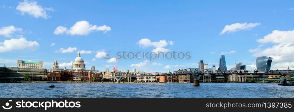 LONDON - JULY 27 : Buildings on the North Bank of the River Thames in London on July 27, 2017
