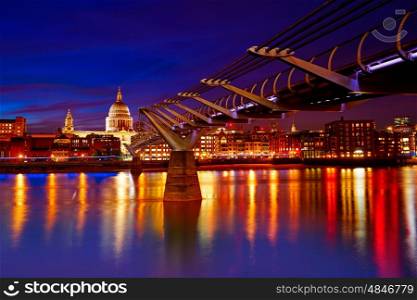 London Millennium bridge sunset skyline in UK at dusk